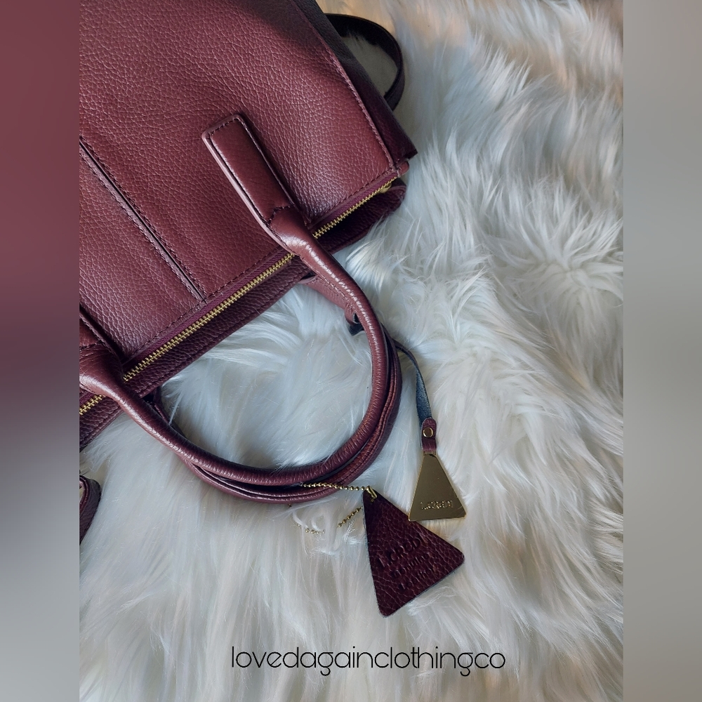Beautiful auburn handbag by L.Credi